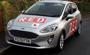 Bruce York Driving the RED Driving School trained Instructor teaching Inside York Ring Road Only in a Manual Car
