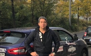 Fahrschule am Adenauerplatz (russisch / deutsch)