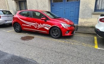 Debussy Driving School