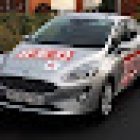 Bruce York Driving the RED Driving School trained Instructor teaching Inside York Ring Road Only in a Manual Car