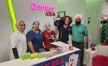 Mt Gravatt Dental -- Dr George Coumbis | Dr Manna Kaur Kohli
