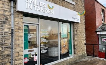 Smiles in Tandem Dental