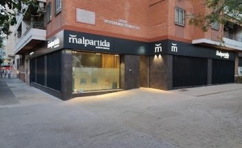Clínica Dental Malpartida Sevilla — Periodoncia e Implantes — Dentista Sevilla