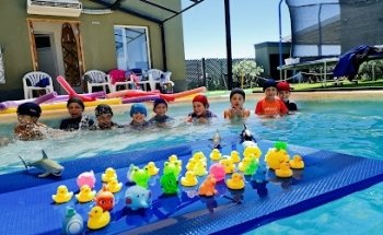 Cyrus Escuela de natación.