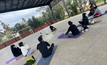 Tierra de origen Clases de Yoga