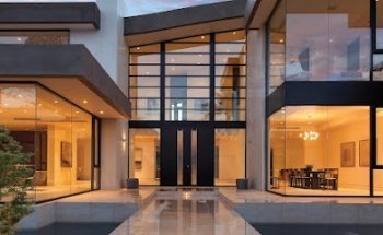 AT HOME IN GENEVA Sàrl