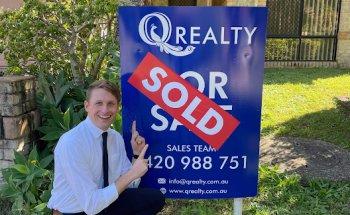 Q Realty