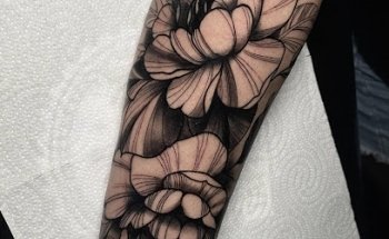Black Corner Tattoo