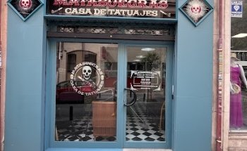 Matasuegras casa de tatuajes