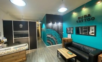 Buda Tattoo. Tatuatge piercing y microblading