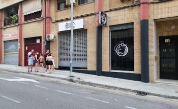 Adosis Tattoo & Piercing