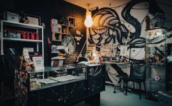 Dark Wave Ink Tattoo