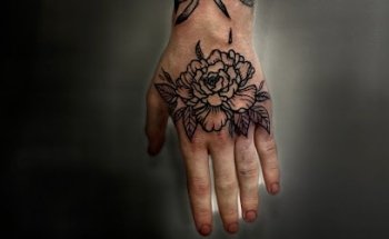 Tatuajes & Piercing Sección Áurea