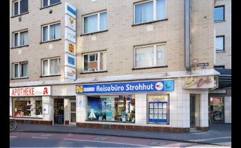 Reisebüro Strohhut